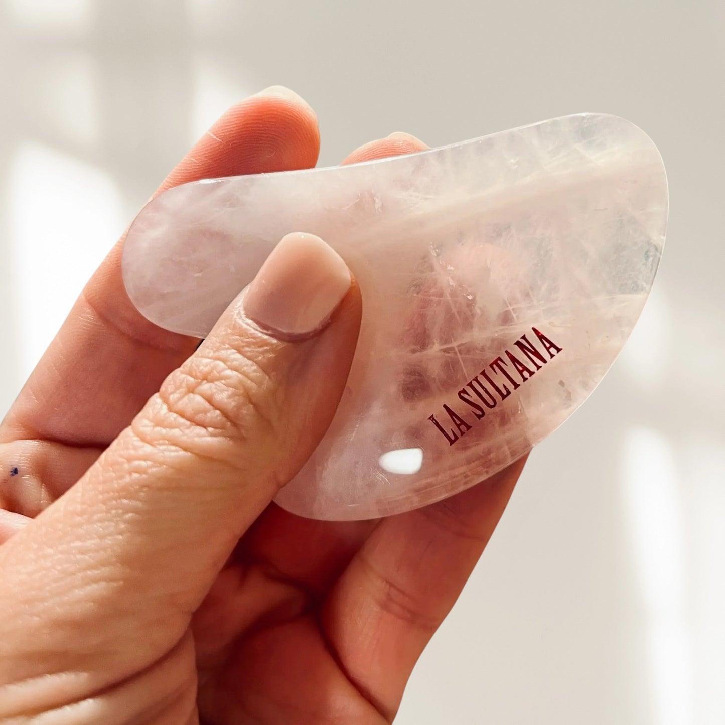 Gua Sha en quartz rose